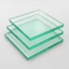 Glass effect acrylic sheets stacked on top of each other at an angle, creating a transparent and orderly arrangement.