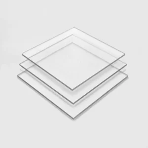 Anti-Reflective Polycarbonate Sheet Clear anti-reflective plastic sheets stacked on top of each other, creating a transparent and orderly arrangement.