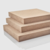 12mm thick MDF sheets stacked on top of each other, in an orderly arrangement.