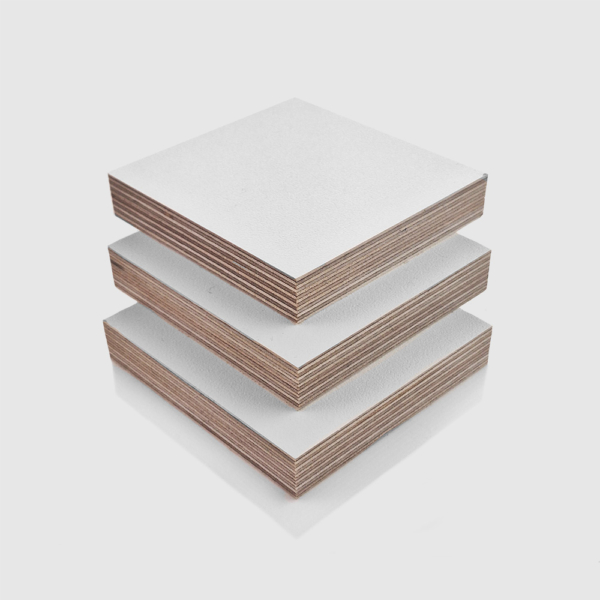 18mm White PP Faced Plywood (WISA Multiwall) sheets stacked on top of each other, in an orderly arrangement.