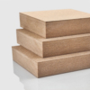 22mm thick MDF sheets stacked on top of each other, in an orderly arrangement.