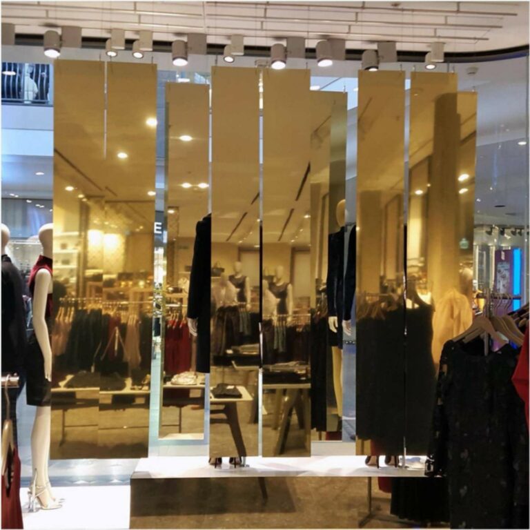 Gold mirrored sheets used for retail design.