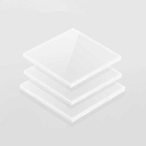 Stacked sheets of white polycarbonate.