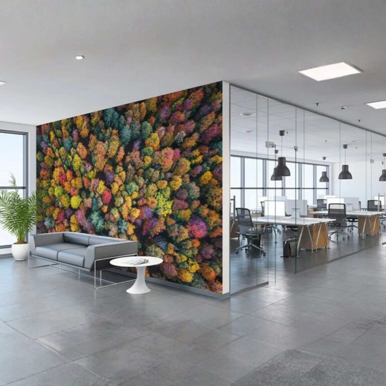 An office workplace environment with a printed feature wall.